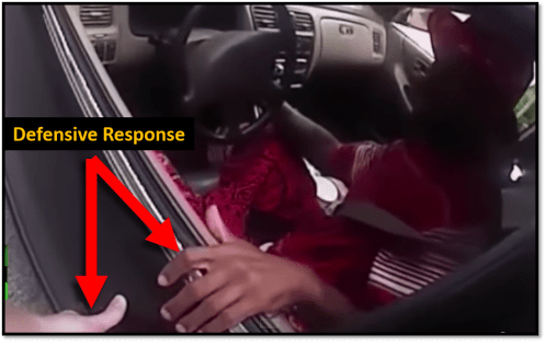 Holding the door closed in an act of self defense. 